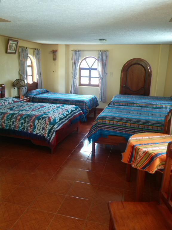 Hostal Curiñan Otavalo Habitación foto